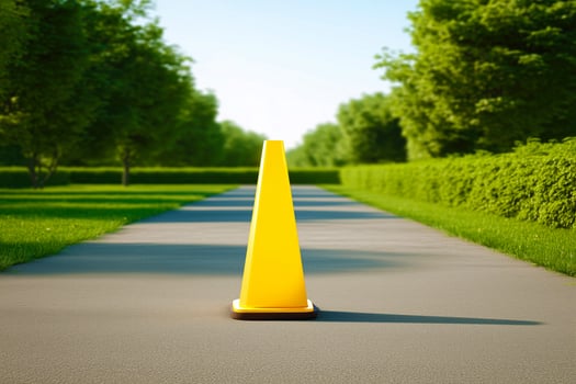 Yellow cone is on the road photo