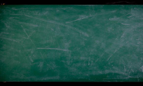 School board with chalk written on it, no writing, free space for texts green photo