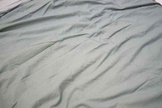 Soft textured fabric draped on a surface creates a serene atmosphere photo
