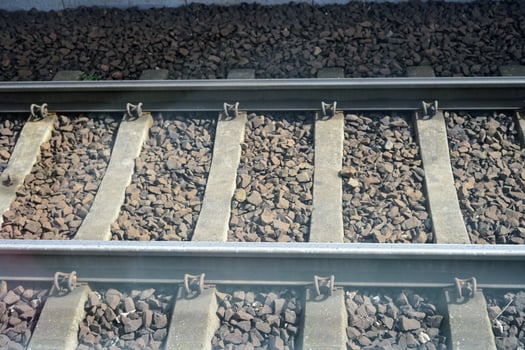 Fast moving railways through train window trip travel road green passenger seat speed railways photo