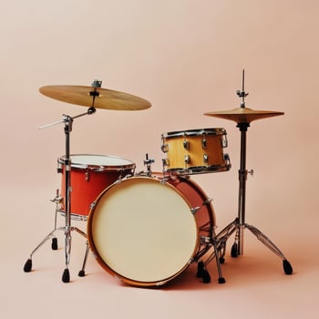 Classic drum set on a soft pink background photo