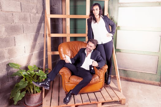 a couple of young business people in the new offices under construction photo