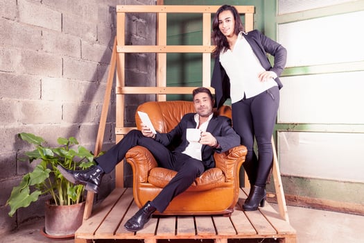 portrait of a couple of entrepreneurs in the new offices under construction photo