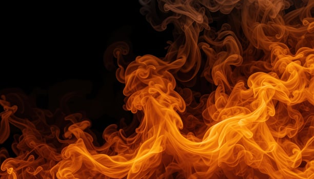 Intricate orange flames and smoke against a dark background. photo