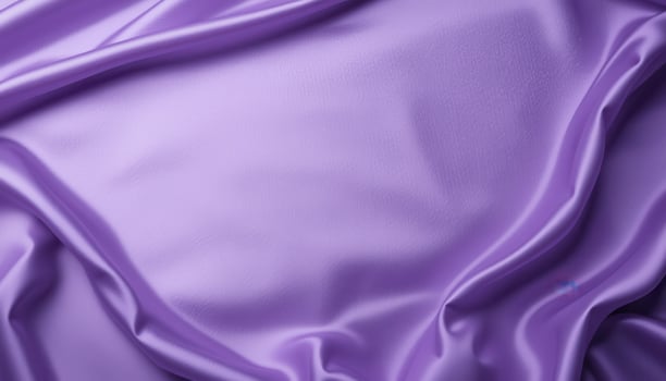 Close-up view of flowing, luxurious purple fabric. photo