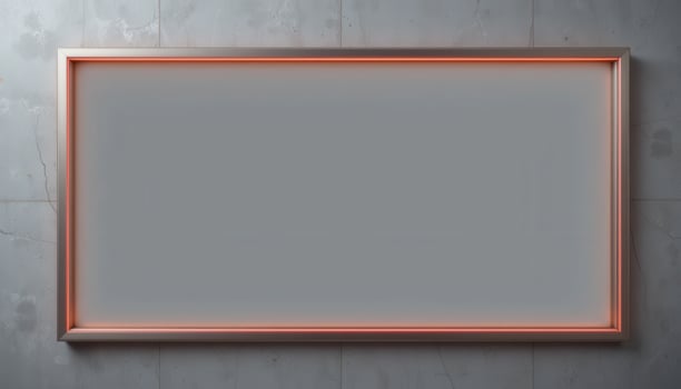 Empty rectangular frame with a light peach border against a gray wall. photo