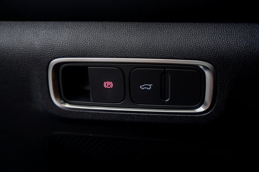 The Car Interior Control Panel with various buttons for usability and safety photo