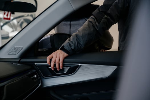 Closeup view of man opening car door photo