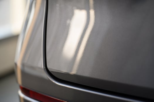 Close up view of the rear part of the modern grey car photo