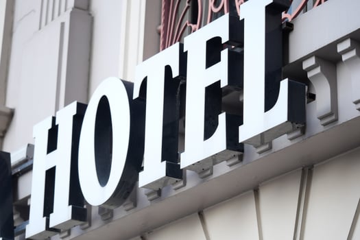 Modern hotel sign showcases elegance and prominence in the city photo