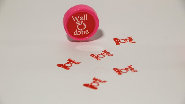 Childrens praise stamp illustration, Red Child Friendly Rubber Stamp Seal . photo