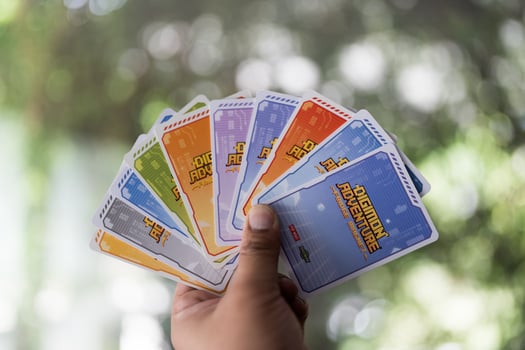 Bangkok, Thailand - May 6, 2025 Hold many cards from Digimon Adventure Fridge Magnet Series Figures photo