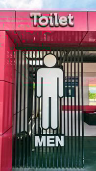 Modern Public Men's Restroom Entrance with Bold Signage and Contemporary Design Elements photo