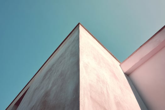 Minimalist white building against clear blue sky photo