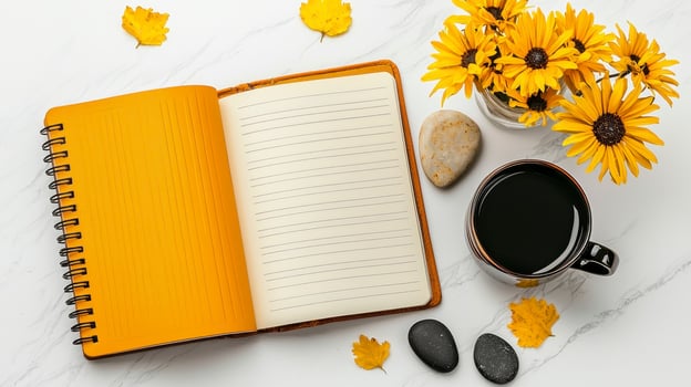 Flatlay of Yellow Notebook Coffee and Flowers on Marble photo