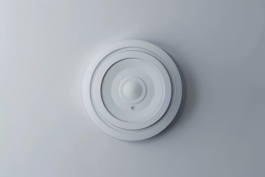 Modern ceiling lamp illuminating empty room with minimalist design photo