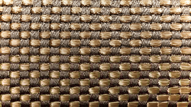 Close-up view of a woven fabric showcasing an intricate design with eco-friendly textures ideal for mockup presentations. Emphasizes free space for added content. photo