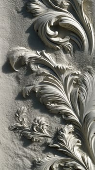 Ornate plaster detailing on historical building wall photo