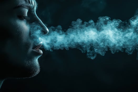 Person releasing smoke creates a dramatic effect photo