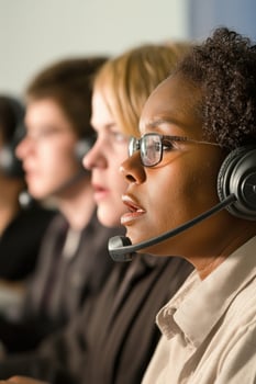 Diverse technical support team working collaboratively to assist customers through effective communication photo