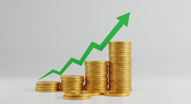 Financial growth with stacked coins and green arrow symbolizing success photo