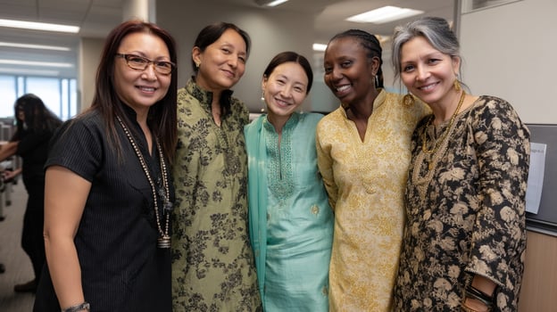An office event featuring employees wearing traditional attire representing their heritage fostering a spirit of diversity and cultural pride a staff photo
