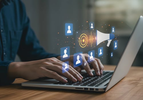 Online Communication on Laptop with People Icons and Megaphone photo