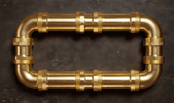 A golden pipe frame on a dark background photo