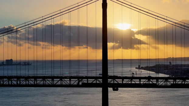 Aerial View of 25th April Bridge at Lisbon District of Lisbon Portugal.. Elevated Road Cinematic. photo