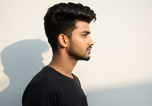 A man with a black shirt and a shadow photo