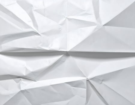 Crumpled paper background with white background photo