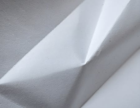 A close up of a folded piece of paper photo