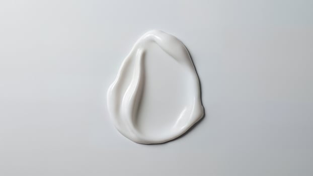 White Cream Smear Isolated On Background photo