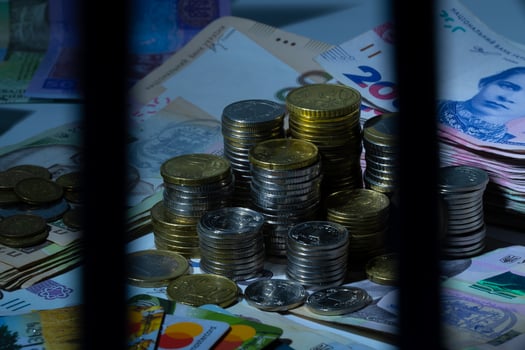 Bank vault with cash. Coins, banknotes, bank cards. photo