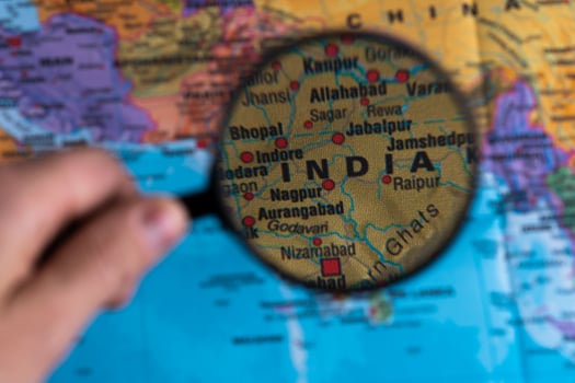 Map of India through magnifying glass. photo