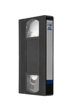 Retro VHS cassette with a blank label and E-180 high grade marking, isolated on white back photo