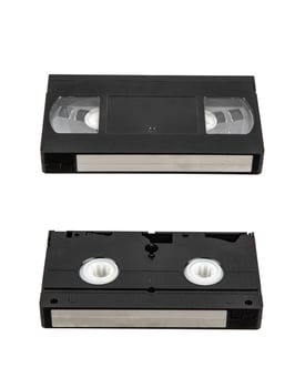 ront and back view of classic VHS cassettes on white background photo