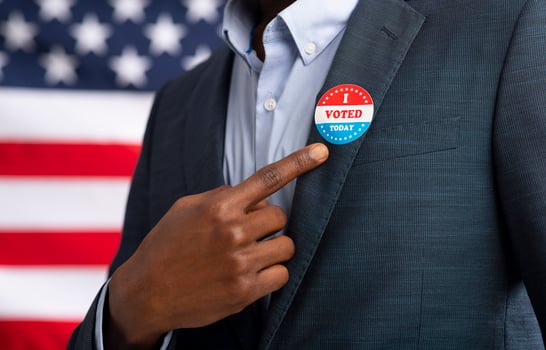 Patriotic elections in America 2020. African American US resident showing with finger on inscription I voted today photo