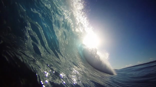 Powerful Ocean Wave Crashing Under Bright Sunlight photo