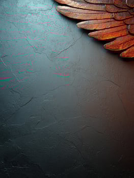Dark textured background with bronze wing detail in corner photo