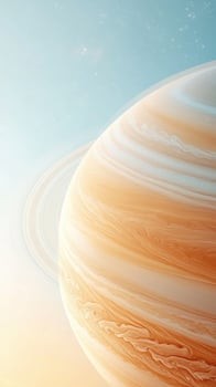 Giant planet with rings, orange and white banded atmosphere, floats in space, background with soft light, tiny stars sparkle. photo