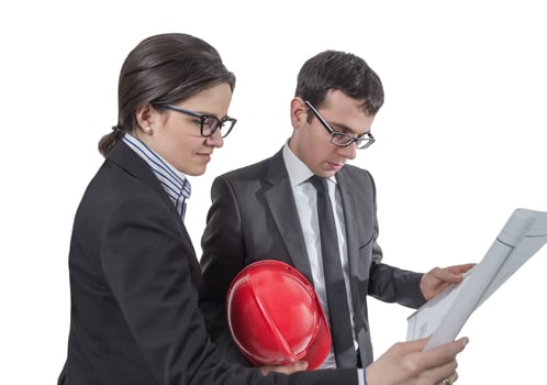 Couple of architects revising house project photo