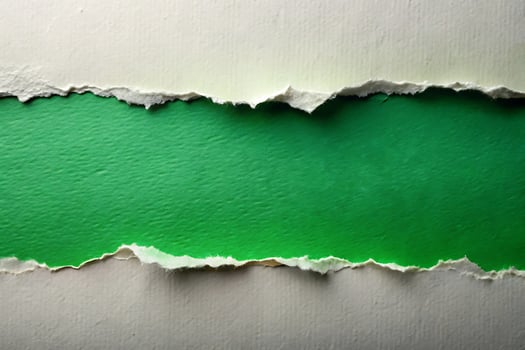 Abstract torn paper background with vibrant green color reveal concept photo