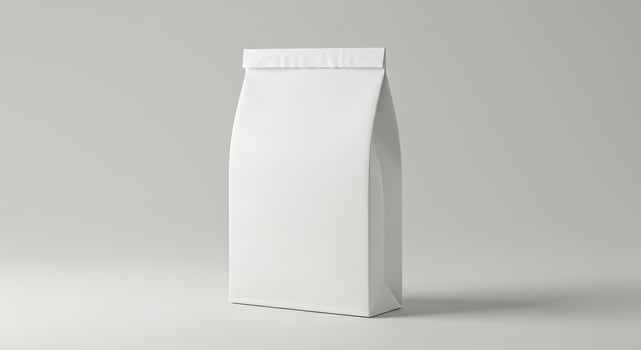 White paper bag with blank side on gray background photo