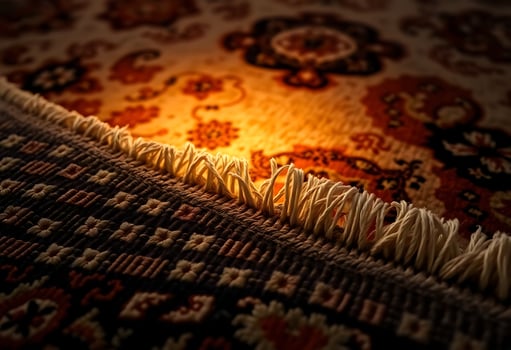 close up of a rug with a light shining on it photo