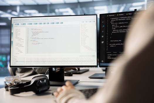 Technician in server room implementing advanced cooling and power management solutions to reduce energy consumption. IT expert integrating new technologies and systems in data center photo