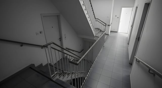 Stairwell with Doors and Railing photo