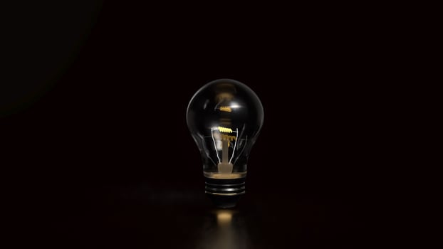 Light bulb on Black background for creative concept 3d Rendering . photo