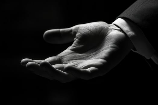 Black and white photo of a man's hand