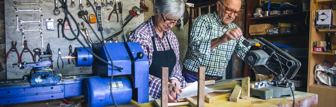Banner of senior couple in a carpentry photo